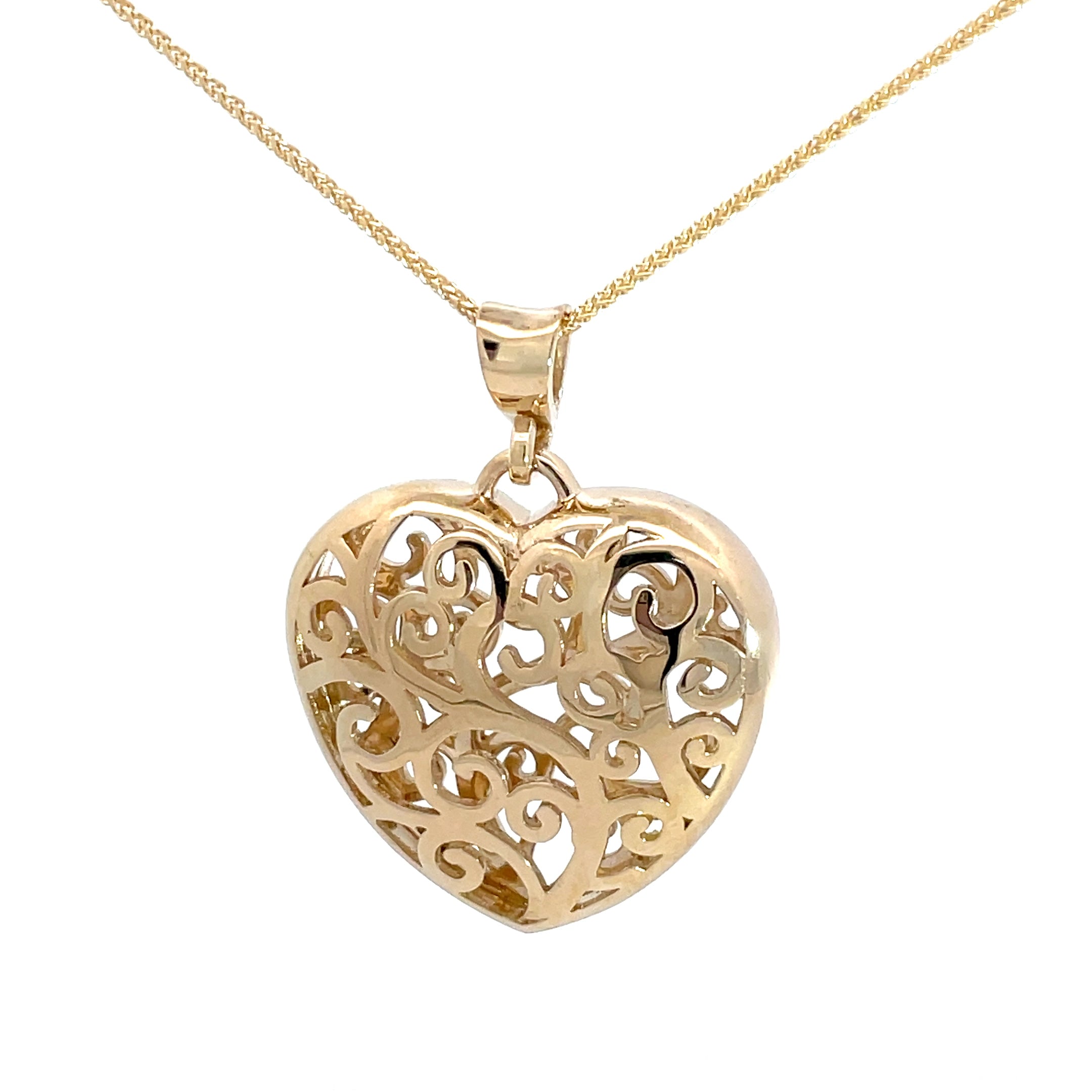 Gold filigree heart on sale necklace